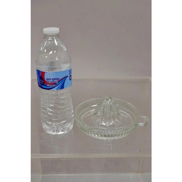 Vintage Art Deco Clear Glass Ribbed Hand Juicer Citrus Orange Handle & Lip. Circa Early 20th Century. Measurements: 3" H x...