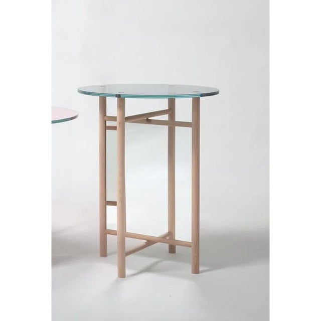 Glass son table by llot llov dimensions: ø 48 x h 60 cm materials: beech, mirror, glass if you look at the elias and son...