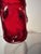 A striking example of mid-20th-century British glass design, this Ruby Red Knobbly Vase was created in 1970 by Geoffrey...