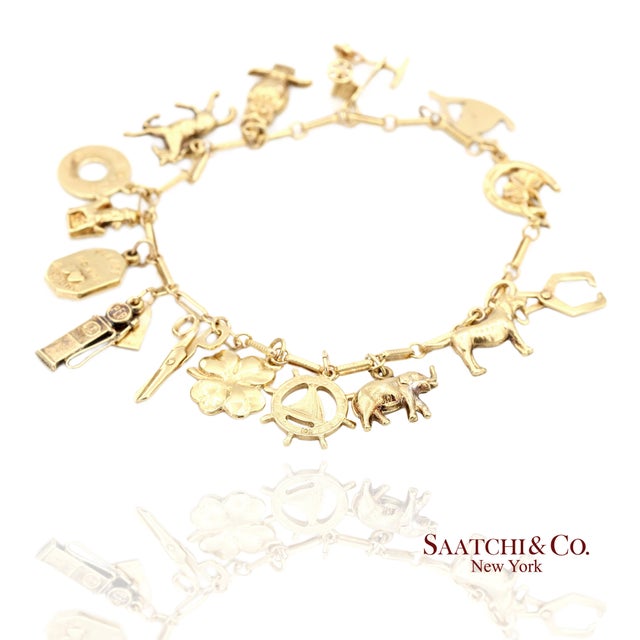Vintage 10k Yellow Gold Charm Bracelet Metal Type: 10k Yellow Gold Total Item Weight: 19.1 Grams Length: 7.5 in Width:...