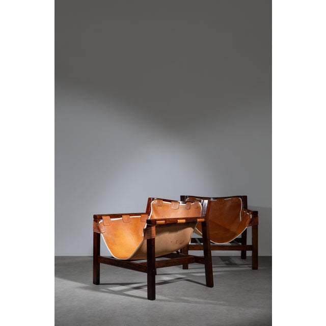 A pair of iconic Safari Lounge Chairs, designed by Carlo Hauner for Forma in the 1970s. The clean architectural lines of...