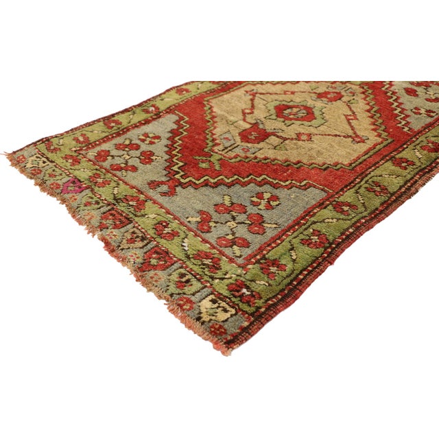 51492 Vintage Turkish Yastik Rug, 01'10 x 02'07. This hand-knotted wool vintage Turkish Yastik rug showcases the vibrant...