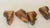 Two pairs antique small baby shoes copper for home decor.