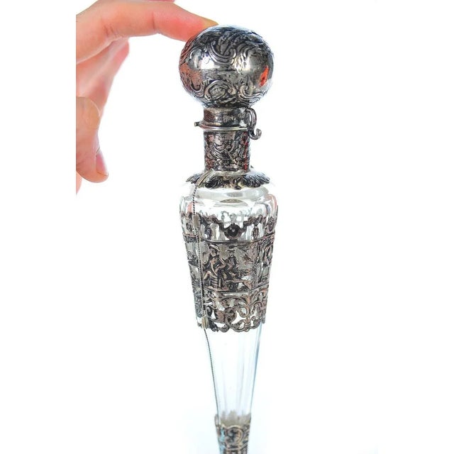 I am offering a 19th century rare crystal and repousse sterling laydown perfume bottle. Please check the pictures by...
