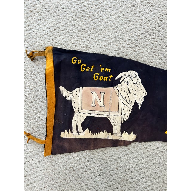Vintage 1950s United States Naval Academy pennant featuring the beloved Navy goat mascot and the spirited slogan “Go Get...