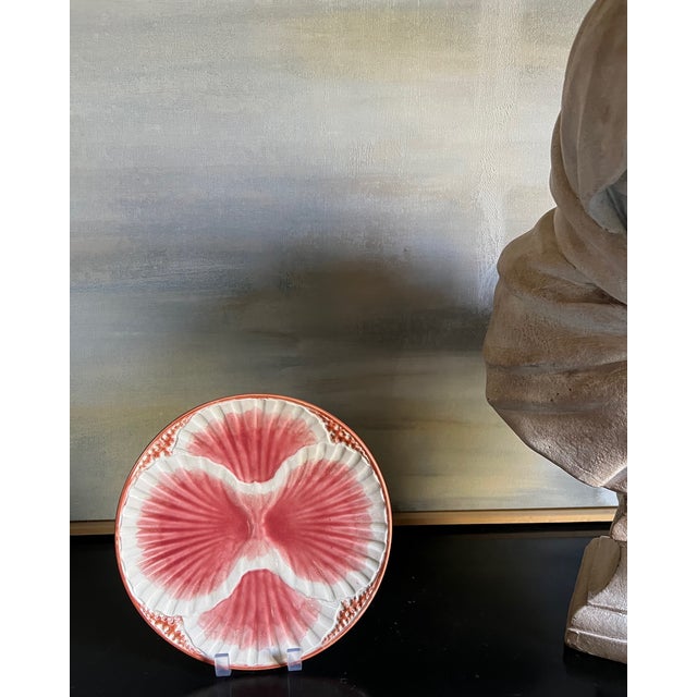 Majolica pink shell motif plate made in France by Sarreguemines around the 1920's.