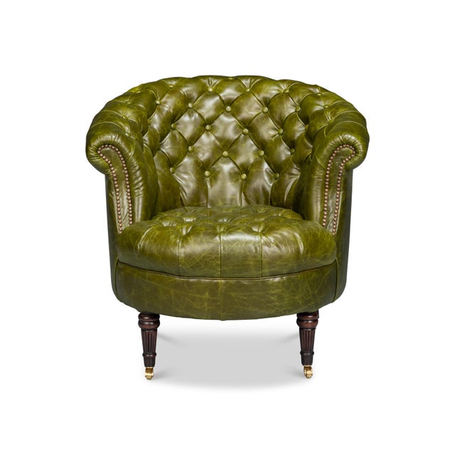 Upholstered in rich, top-grain British Green leather, its elegantly curved barrel back is adorned with deep button...