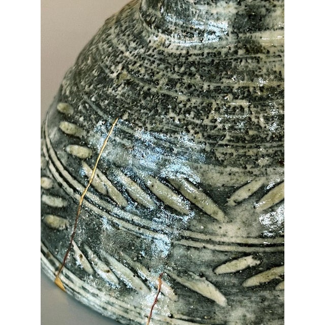 A Korean Hori-Mishima Chawan (tea bowl) circa 16th-17th century (Joseon Dynasty). The tea bowl is of an upright conical...