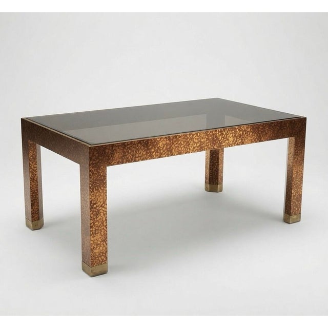 This Vintage Henredon Faux Tortoise Coffee Table from the 1970s exudes a sense of mid century modern sophistication. The...