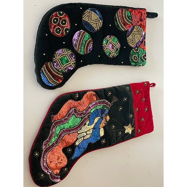 Two vintage 20 th c gorgeous Christmas stockings embroidered, beaded and with sequins on velvet.