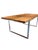 Modern dining table. Reclaimed petrified Amazonian wood top with modern metal legs. Natural wood surface, unfinished. From...
