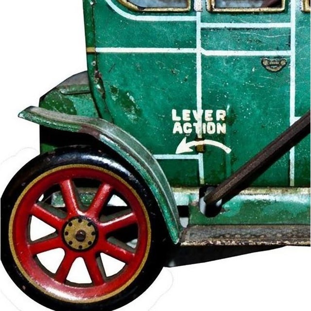 This Lever Modern Toys car is an original vintage toy. Made in Japan by Modern Toys in 1940s. When you pull the lever to...