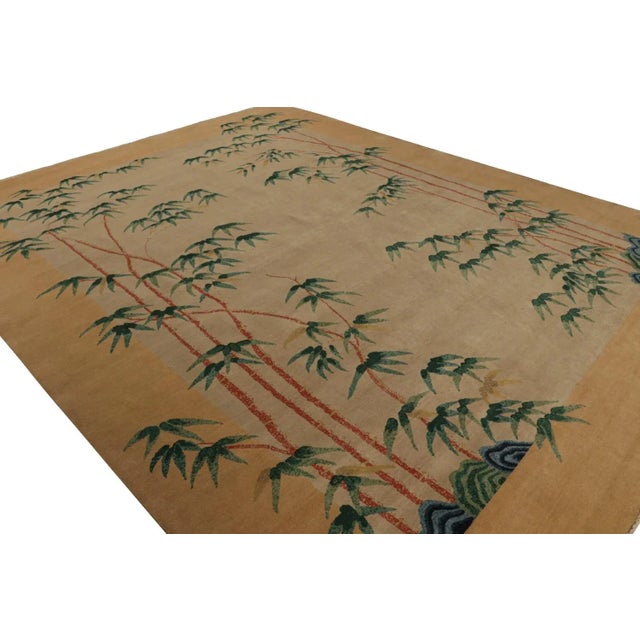 With a minimalist floral pattern inspired by a rare botanical design with bamboo trees in green and blue, on a beige field...