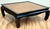Classic Mid Century Asian wood coffee table with burled patchwork inlay to top and painted black frame and Ming legs....
