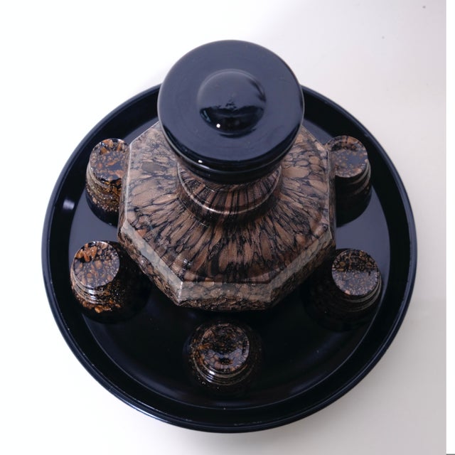 Elegant and precious liqueur set in Murano glass, in Art Nouveau style. Consisting of 6 shot glasses and a bottle....