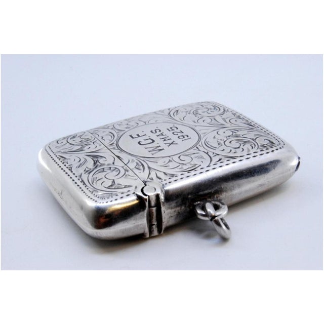 Silver Matchbox with Engraved Plant Motifs and Monogram Card, in Very Good conditions. Designed 1920 to 1949 This piece...