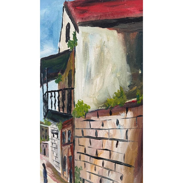 Beautiful original signed framed oil painting of a quaint village with a female pedestrian strolling the street. Bold...