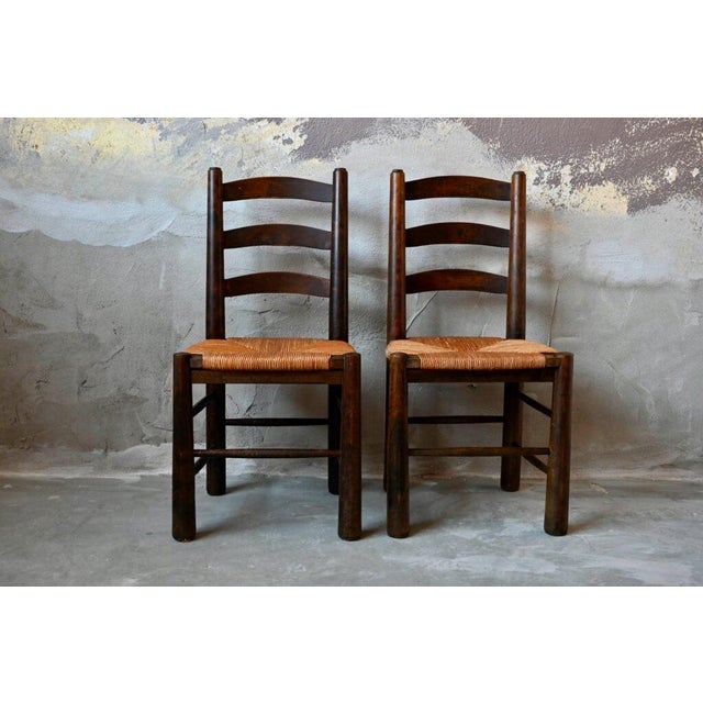 Here is a lovely pair of chairs that look like they came from a farm or a cabin in the middle of the Alps. Featuring a...