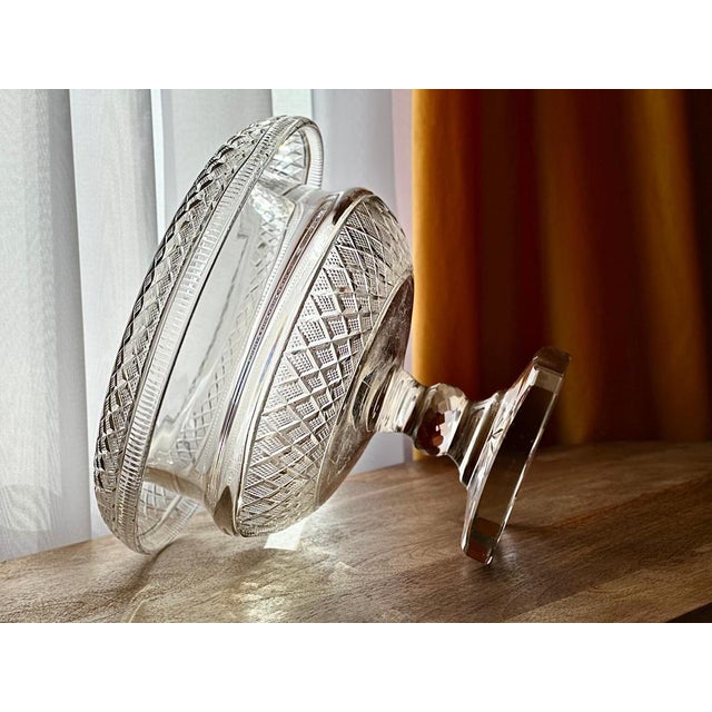 A magnificent example of early 19th-century Anglo-Irish craftsmanship, this antique cut glass pedestal bowl (c.1820–1840)...