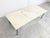 Vintage white marble coffee table with a chromed metal base. Timeless piece to be combined with most interiors. Good...