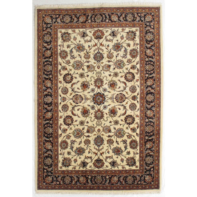 Vintage Hand-knotted Persian Mashad rug from northeastern Iran, known for its workshop production and durable...