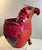 Beautiful vintage red wicker parrot planter. String for hanging has been added. Made of wicker with wood beak and accents.