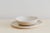 Hand-shaped deep plate in beige stoneware, internally glazed in white. It can be used in the microwave and is dishwasher...