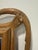 Carved in the faux bois tradition, this wall mirror presents an interlaced, branch-and-vine perimeter that simulates...