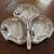 Dolphin footed, heavily silverplated serving dish from the Victorian era. Minor scratches in the scalloped serving bowls....