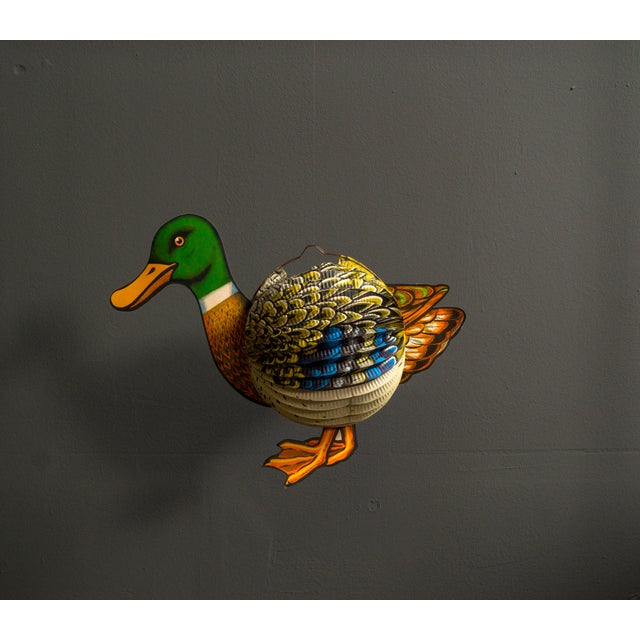 Paper lantern as a duck, made in West Germany from the 60s. Rare lantern as a duck figure, in the middle below, with a...