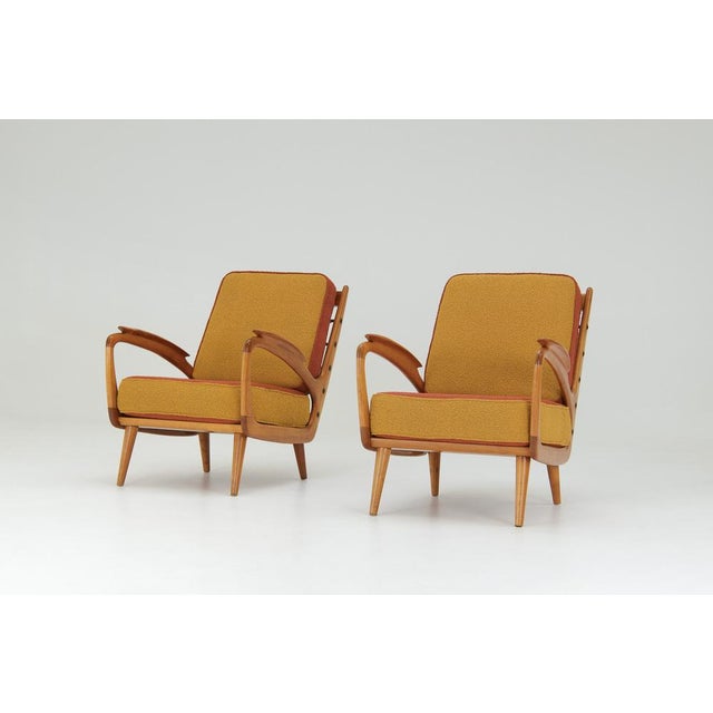A pair of 1950s armchairs, presumably made by B. Spuijs for the Dutch furniture company 'De Ster' Gelderland. The armchair...