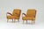 A pair of 1950s armchairs, presumably made by B. Spuijs for the Dutch furniture company 'De Ster' Gelderland. The armchair...