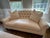 Two elegant custom made, down filled, ivory silk shantung loveseat sofas. Removable sofa cushion hooks securely to the...