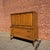 Vintage mid-century modern gentleman’s chest from Broyhill’s Forward collection. The upper cabinet has four paneled doors...