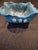 This is a hand-built, square-shaped bonsai bowl featuring a vibrant cerulean blue glaze with multi-colored speckles. Key...