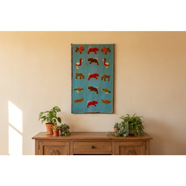 Transport yourself to the vibrant landscapes of Africa with this extraordinary 20th-century beaded wall panel. A...
