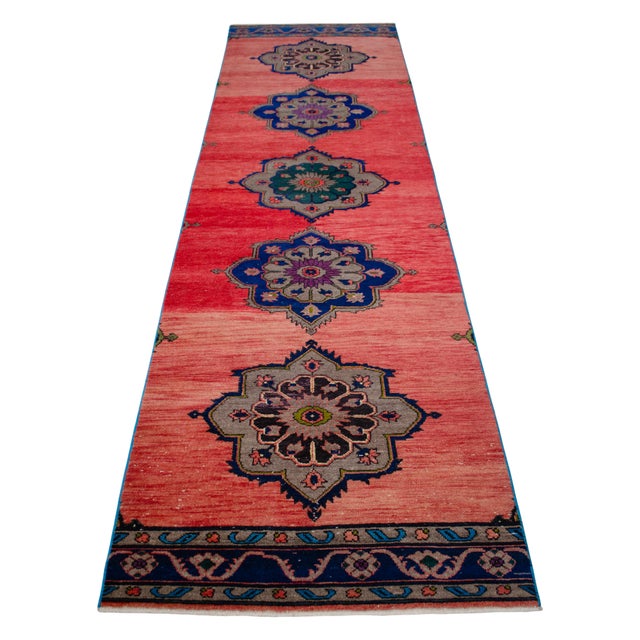 Originating from the village cooperative workshops of Sille, Konya in the 1970s, this magnificent hand-knotted wide runner...
