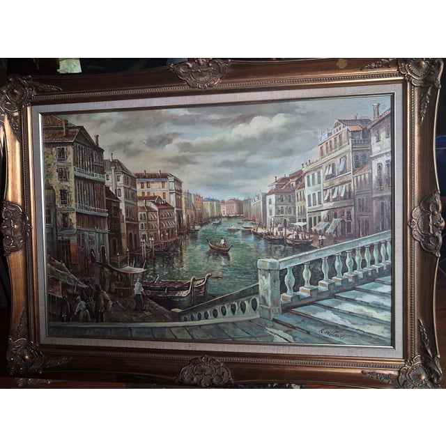 Transport yourself to the romantic waterways of Italy with this captivating mid-century oil painting by artist R. Millano....