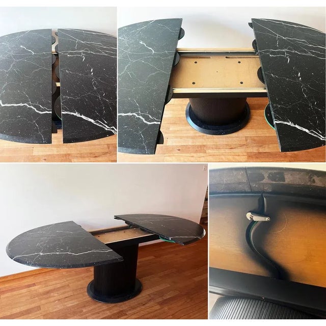 Incredible postmodern 1980s italian marble table with ebonized lacquered wooden base and the same style lacquered wooden...