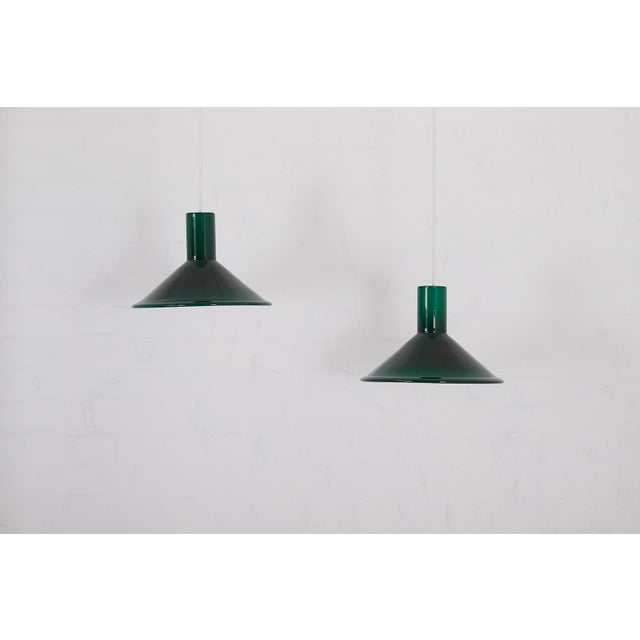 Small opaline glass pendant light, P&T model, by Michael Bang for Holmegaard. Height 20 cm x Diameter 31 cm. LED bulb...