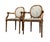 Pair of Louis XVI style armchairs with medallion backs. Cherry wood frame. Attractive modernist upholstery. Fluted legs....