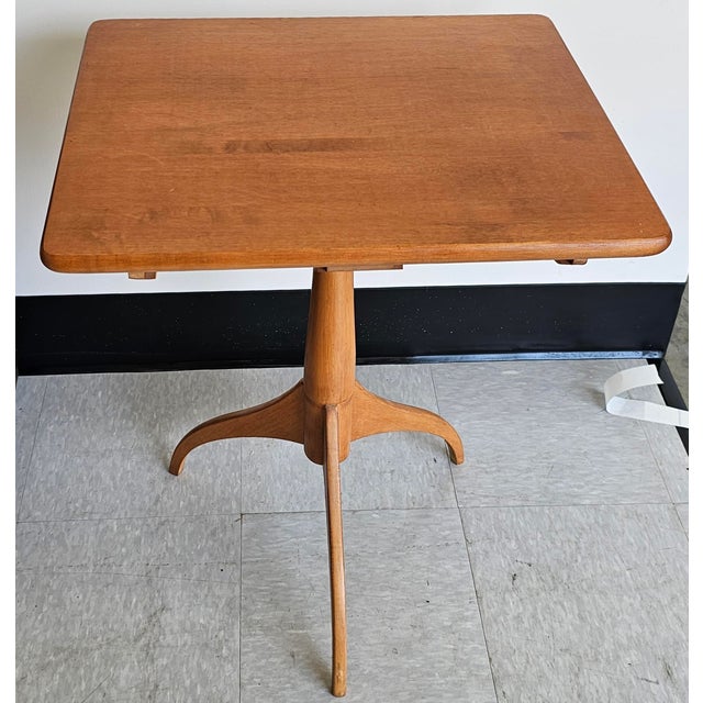 A Shakers Worshops Pedestal Spider Legs Maple Candle Stand. Clean vintage condition. Measures 21" in width, 18" in depth...