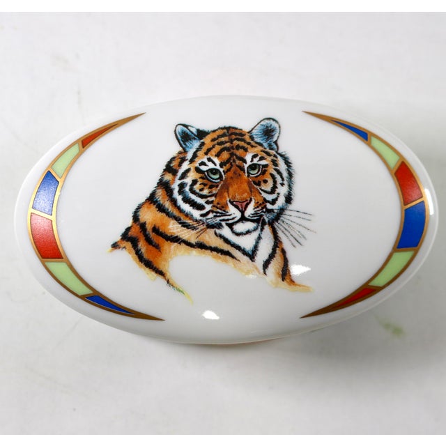 Beautiful set of 3 boxes in the Tiger Raj pattern by Lynn Chase. The lids feature detailed Bengal Tigers framed by...
