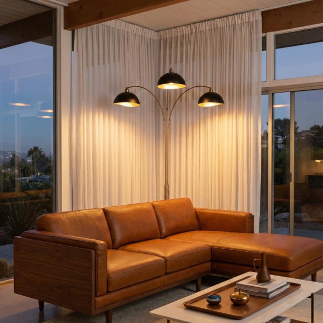 Bring sculptural drama and ambient light to your space with the Luna Bella 3-Light Arc Floor Lamp. Featuring gracefully...