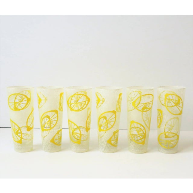 A beautiful and striking set of 6 vintage white and yellow 'lemon' design highball cocktail glasses, circa Mid-20th...