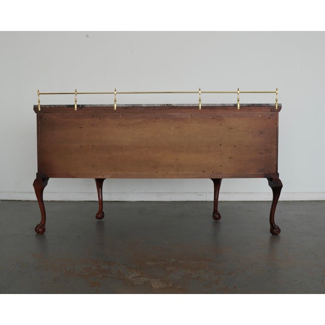 This vintage Century Furniture sideboard, crafted in the late 20th century, showcases classic traditional styling with a...