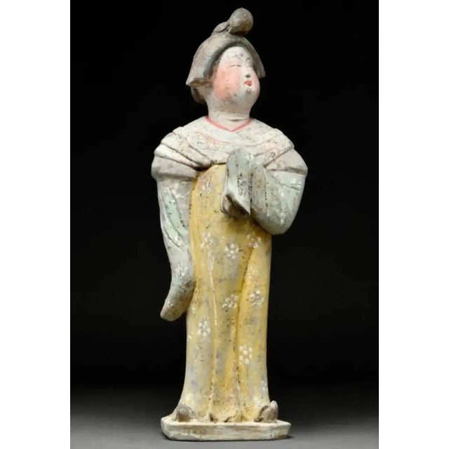 Tang Dynasty painted terracotta fat lady tomb figure China. Tang Dynasty Circa 618-907 Modelled in the form of a...
