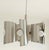 Space Age chandelier attributed to Polam Bielsko, circa 1970. Brushed stainless steel chandelier with six arms and curved...
