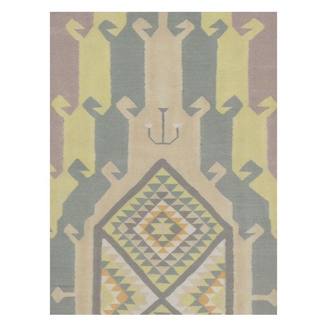 A vintage Indian cotton flatweave Dhurrie runner handmade during the mid-20th century. Measures: 3' 11" x 14' 6".