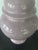 A matching pair of vintage ceramic table lamps. They feature a ginger jar style silhouette finished in a glossy lavender...
